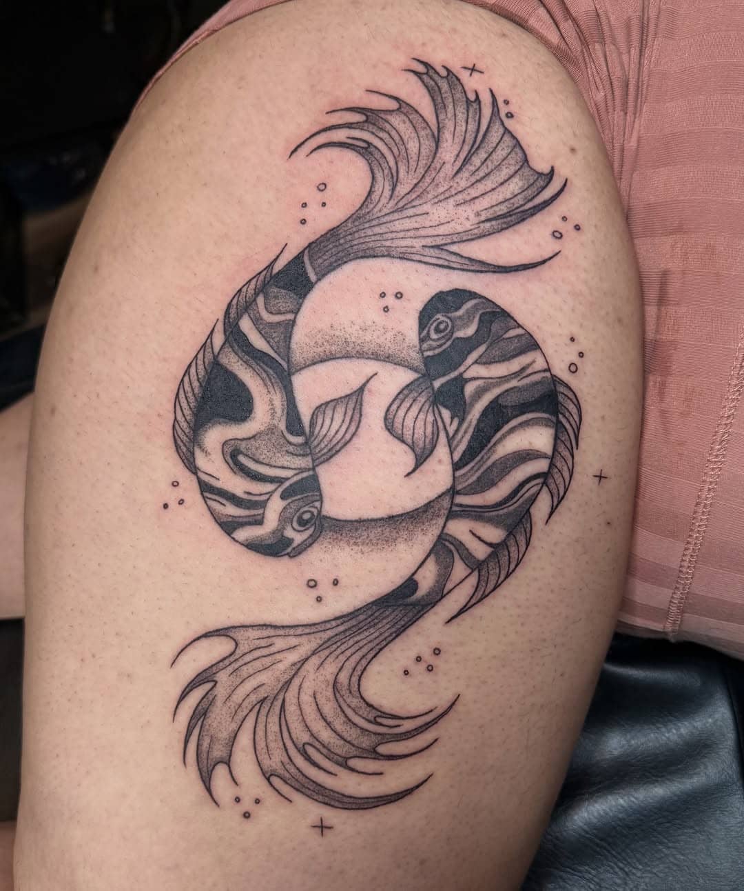 Detailed black and grey twin koi fish tattoo by Michelle Tattooz
